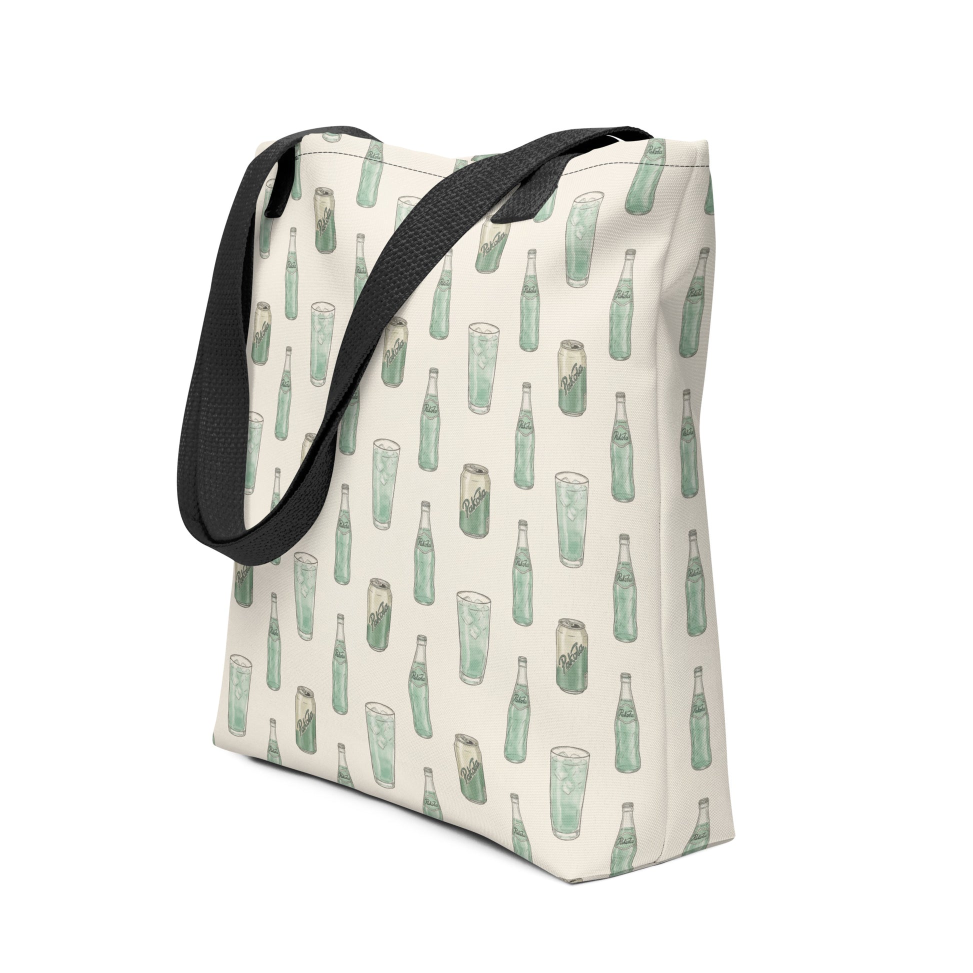 Side view of tote bag with Pakola Pakistani green soda inspired print 